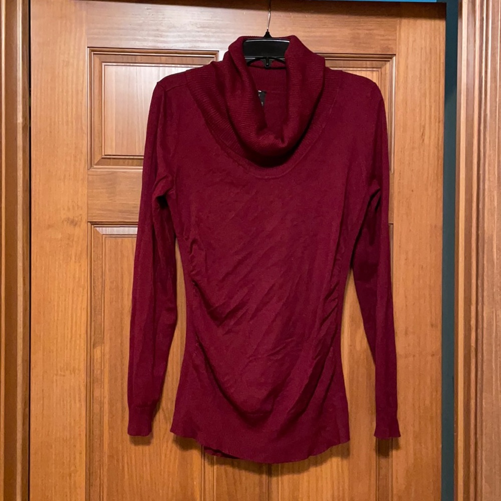 Maurice’s burgundy cowl neck sweater